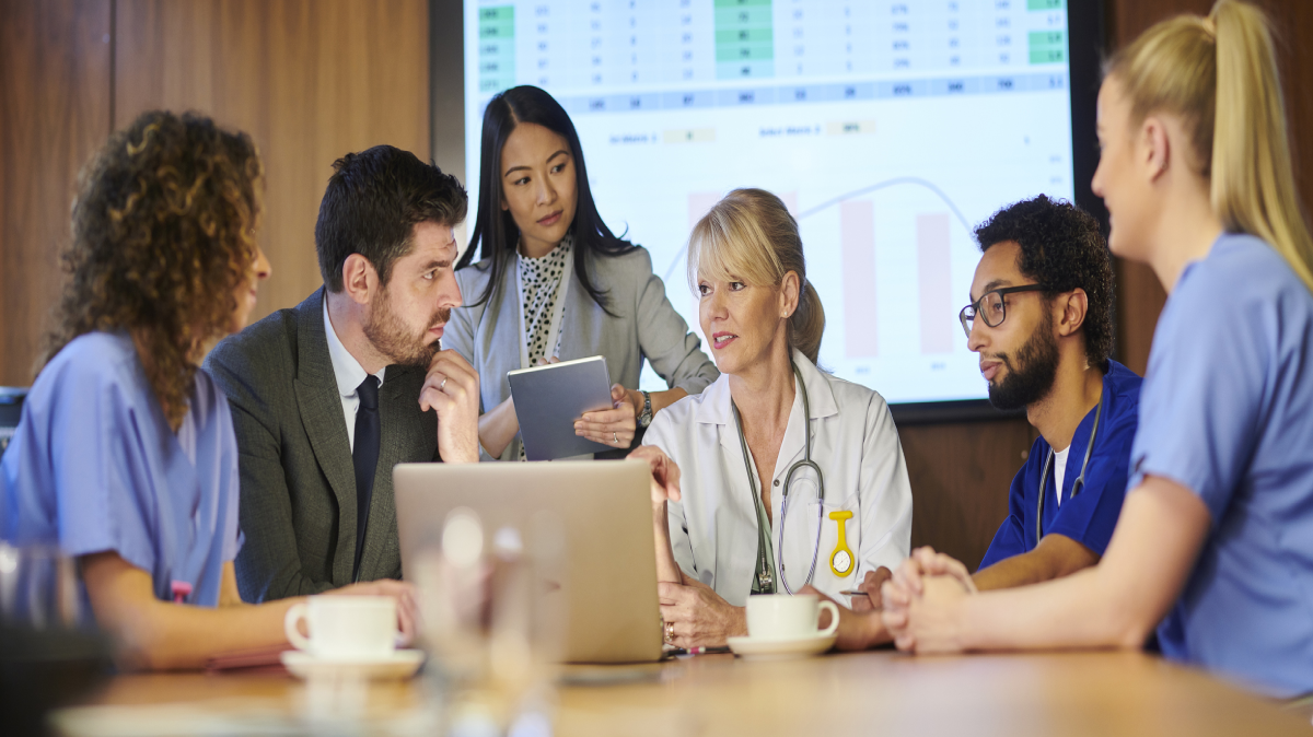 Hospital leaders reviewing their healthcare organization's strategy